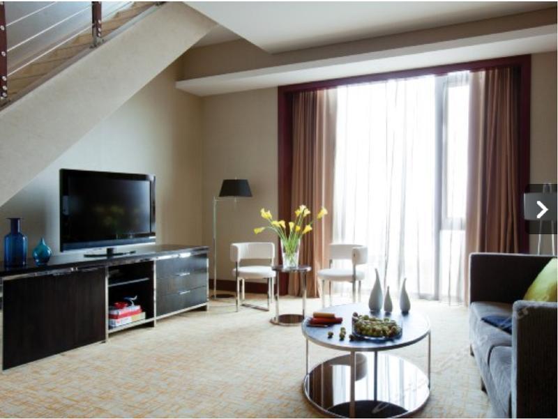 Cordis, Beijing Capital Airport By Langham Hospitality Group Hotel Shunyi ภายนอก รูปภาพ A living room in a typical apartment